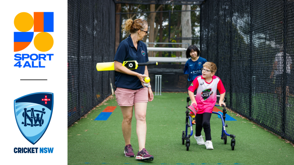 A woman walks with a kid wearing a Cricket Blash pink shirt. She holds a cricket bat under her arm and cricket balls in her right hand. The kid, using a walker, faces the camera and is engaged in conversation with the woman, who is the coach. The coach talks to the child while walking, with her back to the camera. Behind the child stands another person observing the conversation. They are on a cricket pitch with wickets in the background. To the left of this image, Sport4All and Cricket NSW logos are shown.