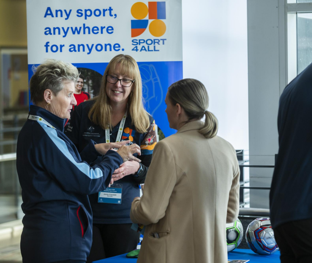 Inclusion coaches speaking with each other