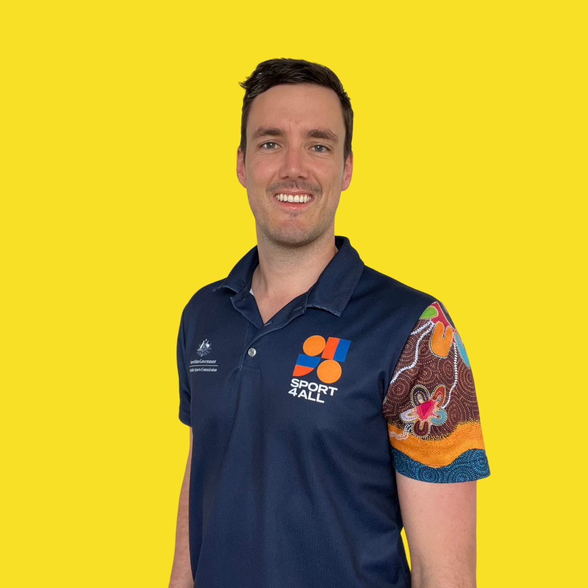 A close-up image of Sport4All's State Manager, Blake. He is wearing the Sport4All polo.