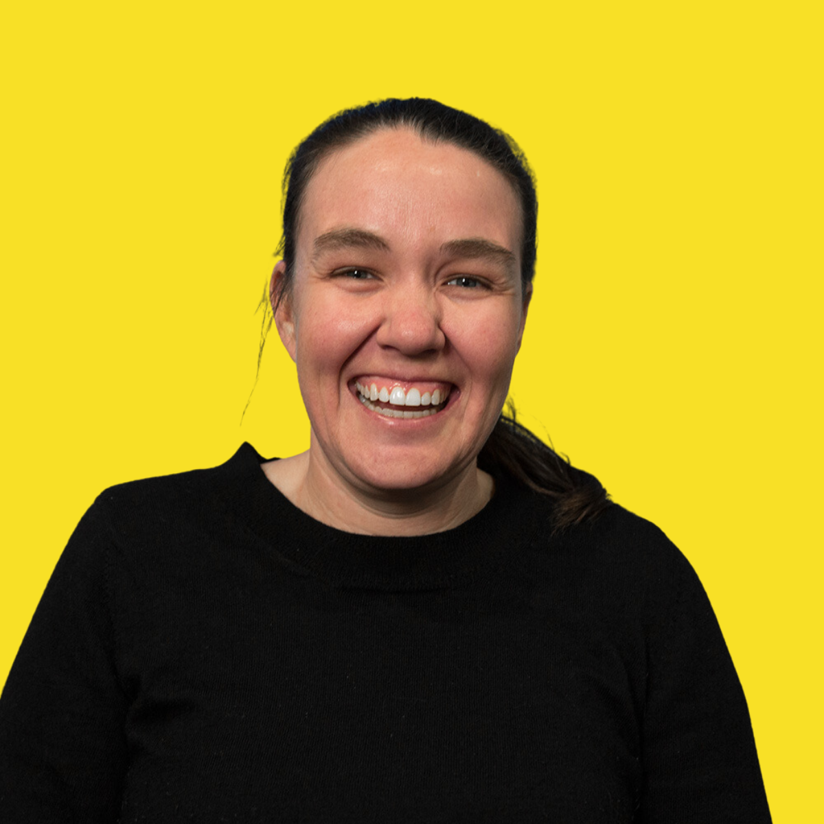 Marita A close-up image of Marita Morgan. She is wearing a black top and is looking at the camera and smiling.