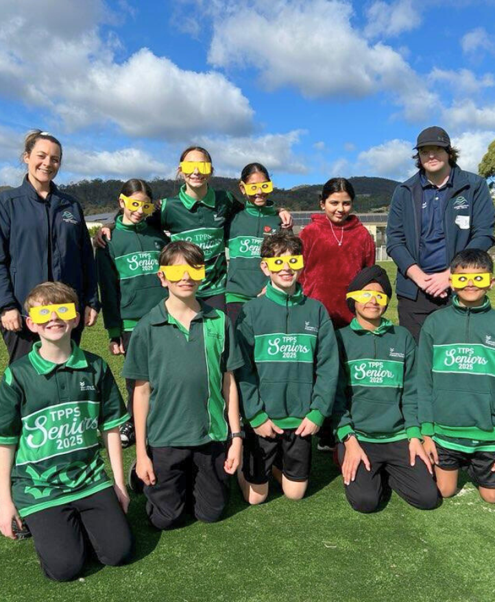 Group of students with eye shades on alongside Sport4All inclusion coach and school teacher.