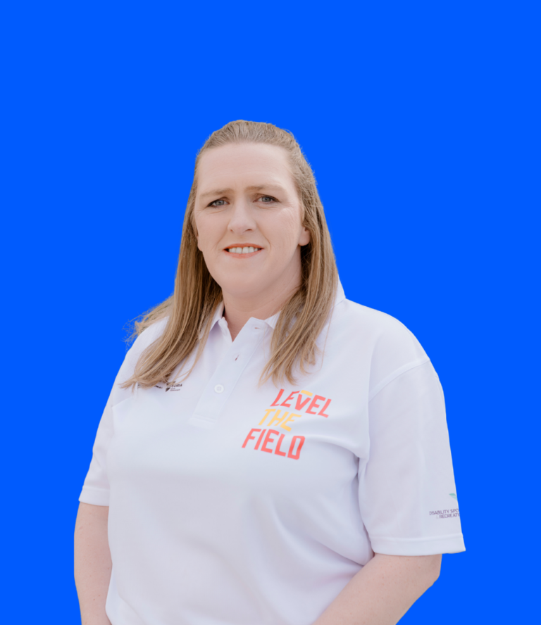 Tarryn's close up image in a white Level The Field branded polo