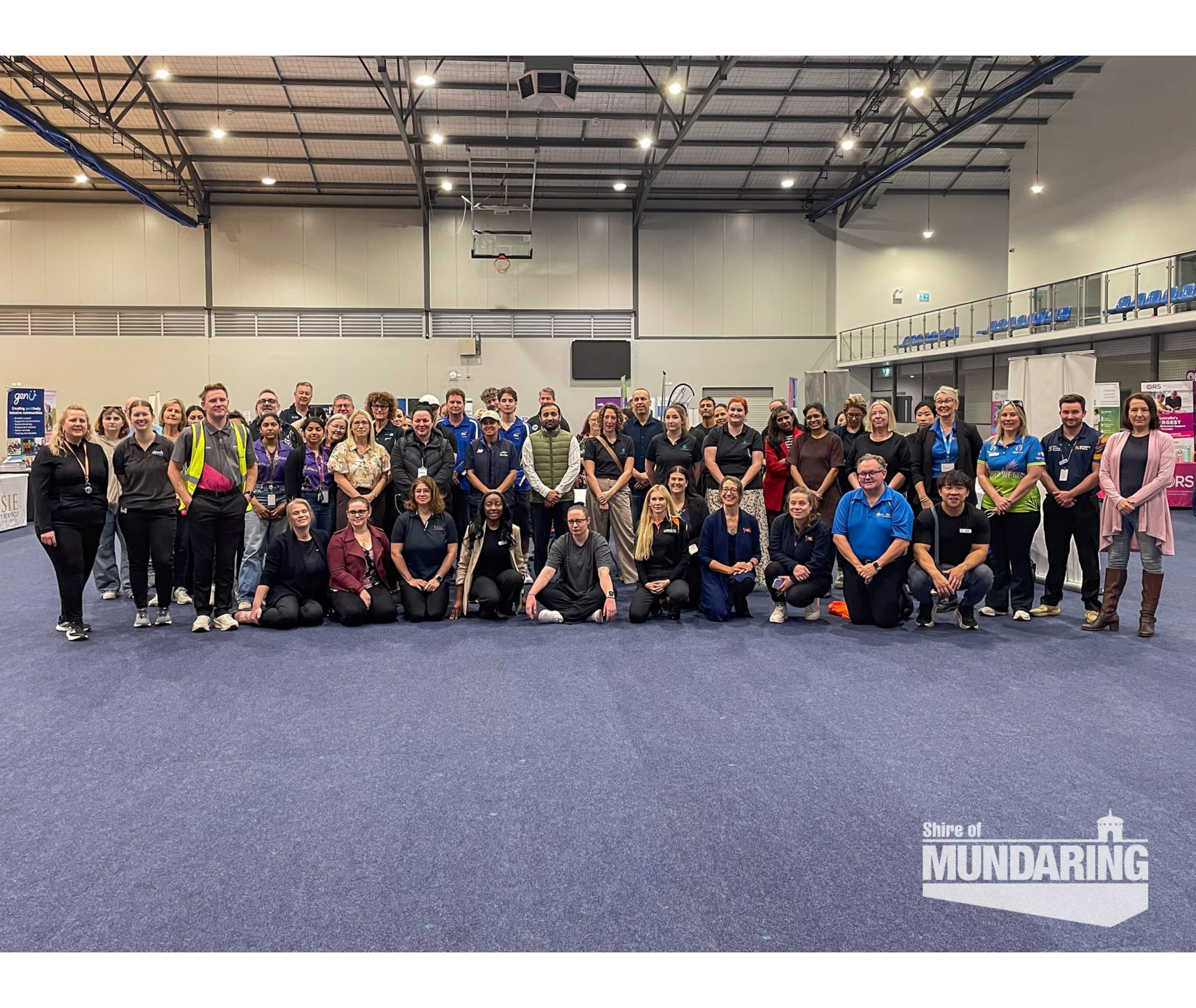 Attendees and organisers gather at a Shire of Mundaring community sport event.