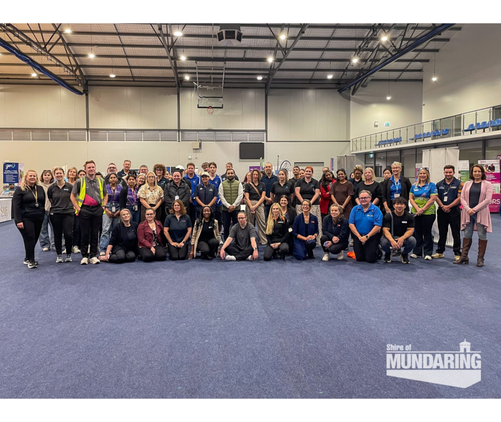 A group photo of all participants at the expo